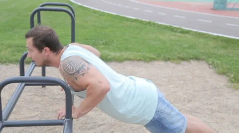 Man Doing Push Ups Outdoors Stock Footage 64378413