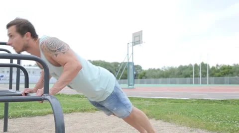 Man Doing Push Ups Outdoors Stock Footage 64378470