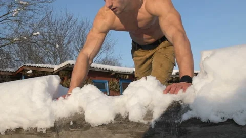 Man doing push ups outdoors in winter Stock Footage 147225785