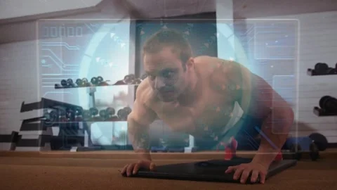Man doing pushup reps on mat, lowering chest activating HUD code overlay on Stock Footage 331713467