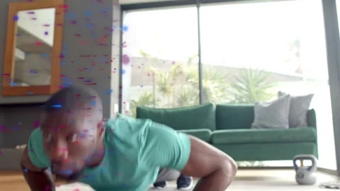 Man doing pushups on mat starting fitness workout phone artifacts appearing over Stock Footage 333221122