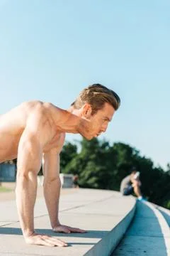 Man Doing Pushups Outdoors Stock Photos