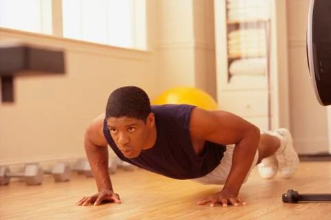 Man doing pushups Stock Photos