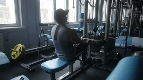 Man is doing seated row Stock Footage 85616038