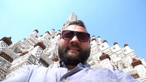 Man doing selfie with an ancient temple, slow motion shot at 240fps Stock Footage 88163405