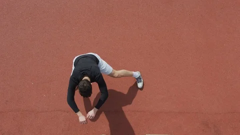 Man doing side lunges Stock Footage 100029348