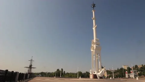 A man doing a side somersault on the background of a square with a large anchor Stock Footage 158166483