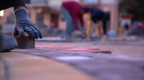 Man is doing  sidewalk tiles Stock Footage 48649450