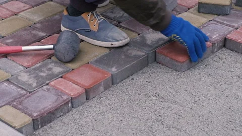 Man Is Doing Sidewalk Tiles Stock-Footage 99944989