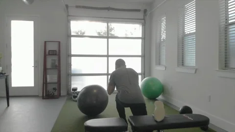 Man doing single leg lunges Stock Footage 90828291