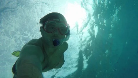 Man doing snorkeling in the sea Stock Footage 120120915