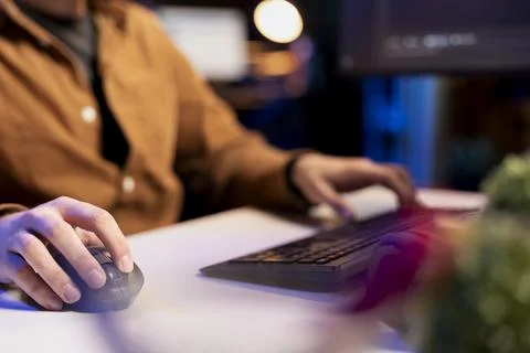 Man doing software quality assurance, reading source code, close up shot Stock Photos