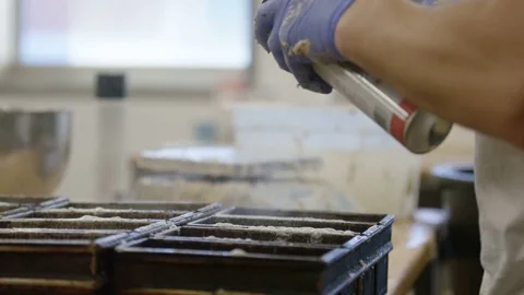 Man doing some baking in Tromsø, Norway, bread spray Stock Footage 76566024