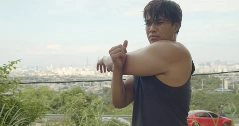 A man doing stretching - medium shoot Stock Footage 146096475