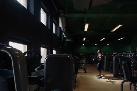 Man doing training alone in the gym Stock Photos