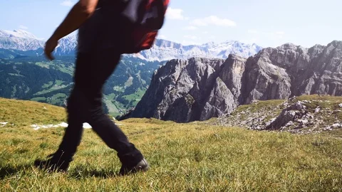 Man doing trekking in the mountains, walking to the top, Alta Badia mountains Stockbeeldmateriaal 97568158