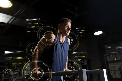 Man doing triceps dip on parallel bars in gym Stock-Fotos