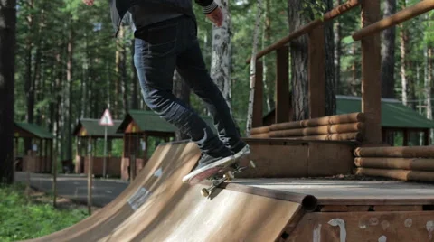 Man doing a trick on a skateboard on the ramp Stock Footage 59240827
