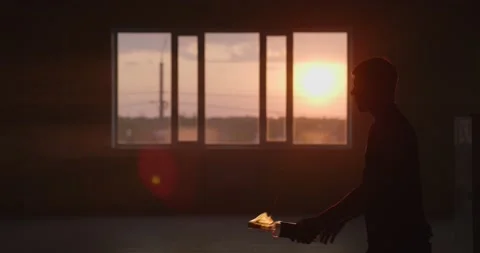 Man doing trick spraying vodka flame from bottle. Slow motion. Video stock 154404938