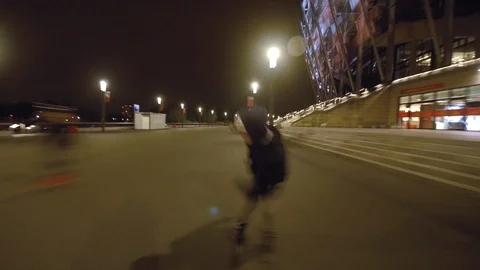 Man doing tricks and jumps on inline skates at night Stock-Footage 120750196