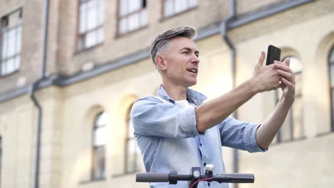 Man doing video call at the street. Stock Footage 142579447