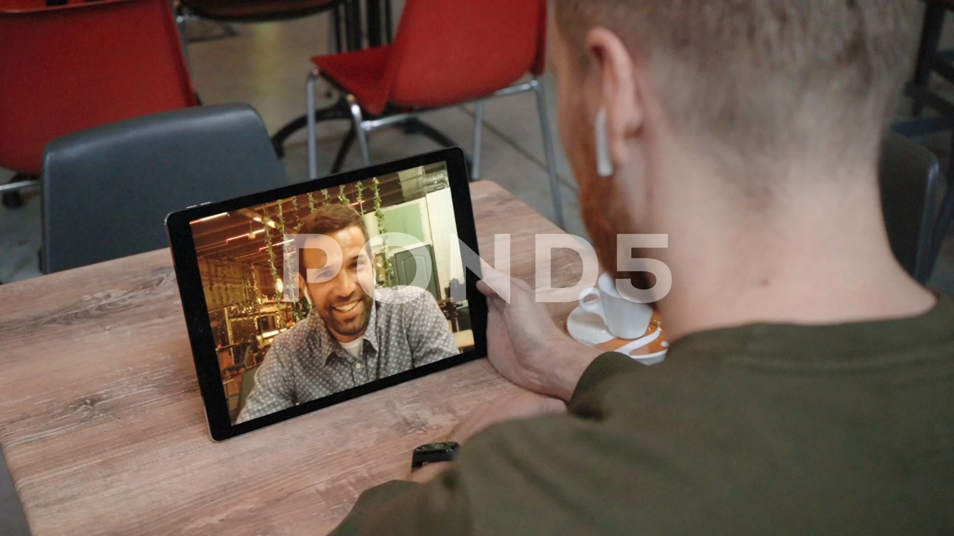 Person hold tablet device talk speak on video call online with