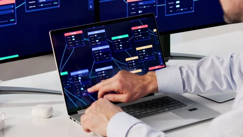 Man Doing Visual Low Code Programming 動画素材 334537971