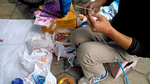Man doing wirework models 4K editorial Stock Footage 72606383
