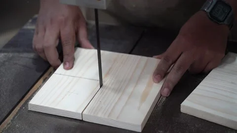 Man doing woodwork in carpentry. Carpenter work on wood plank in workshop Stock Footage 236895930