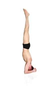 Man doing yoga Stock Photos