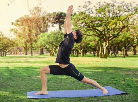 Man doing yoga Stock Photos