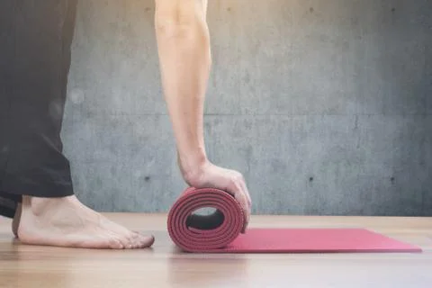 Man doing yoga workout Stock Photos
