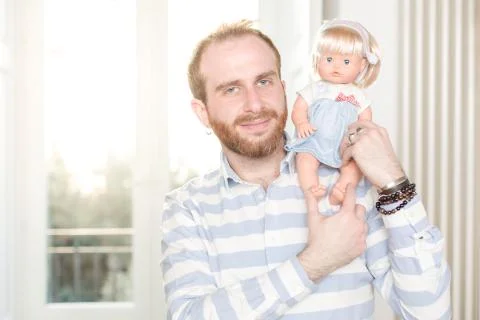 Man with a Doll Stock Photos