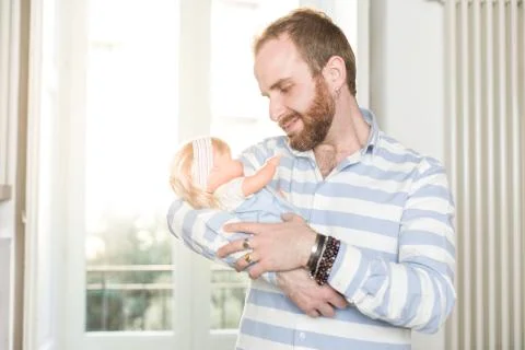 Man with a Doll Stock Photos