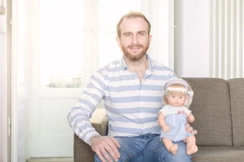 Man with a Doll Stock Photos