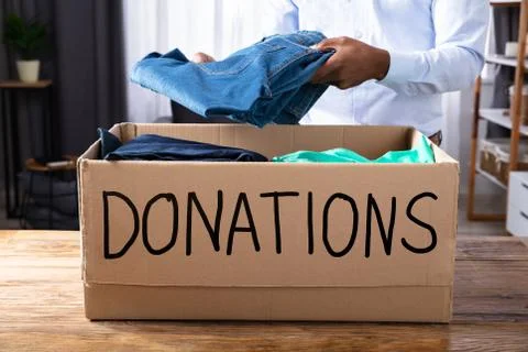 Man Donating Clothes Stock Photos