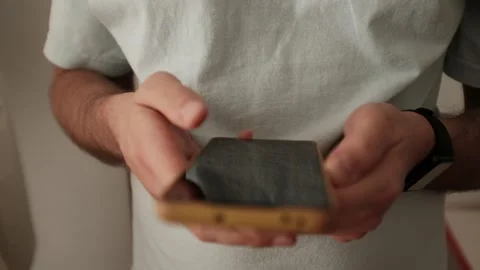 Man doomscrolling a smartphone Stock Footage 316920660