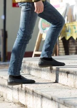 Man down the stairs Stock Photos