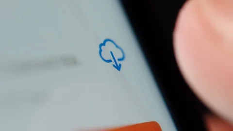 Man downloading an app on iphone Stock Footage 102443490