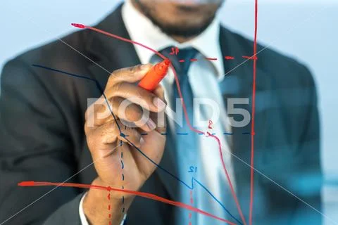 The man draw the graph at the virtual screen Stock Photos