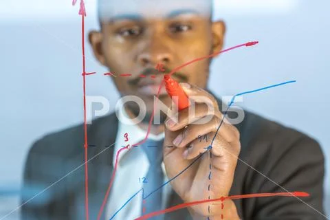 The man draw the graph at the virtual screen Stock Photos