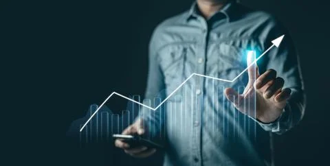 Man draw graphs and progress of business and analyze financial,and investme.. Stock Photos