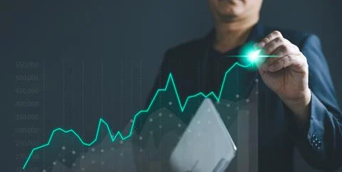 Man draw graphs and progress of business and analyze financial,and investme.. Stock Photos