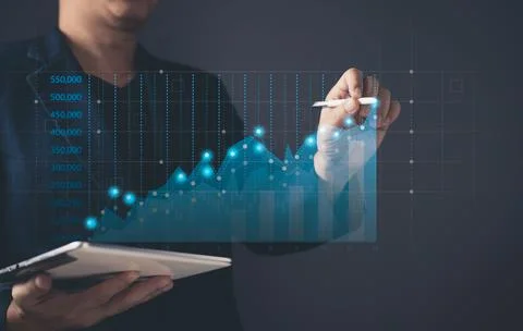 Man draw graphs and progress of business and analyze financial,and investme.. Stock Photos