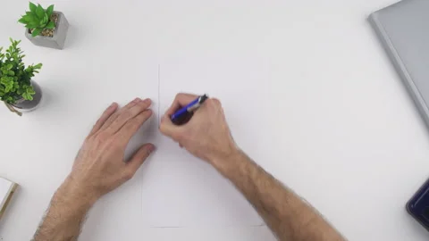 Man draw, sketch an object to be crafted Stock Footage 138064165