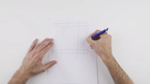 Man draw, sketch an object to be crafted, architectural drawing. Stock Footage 138066849