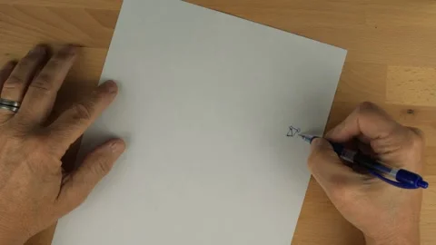 A man drawing abstract doodles in fast motion Stock Footage 132574127