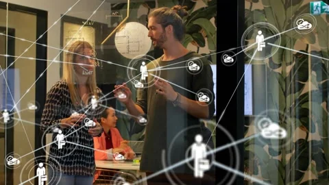 Man drawing circle on glass explaining biz plan, woman tapping phone, network Stock Footage 333774289