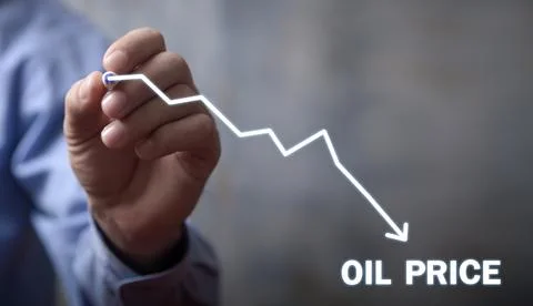 Man drawing down arrow. Reducing oil prices Stock Photos