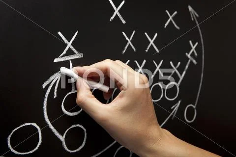 Man drawing a game strategy Stock Photos